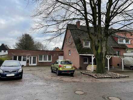 Geräumiges Ein-/Zweifamilienhaus mit großem Garten und Gewerbeanbau in Mecklenbeck