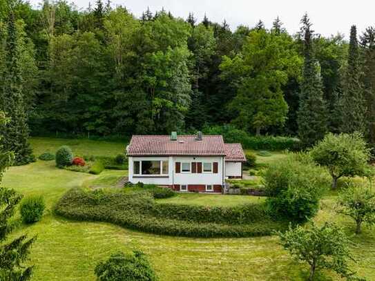 TRAUMHAFTES REFUGIUM: 4.904M² GRUND MIT EINFAMILIENHAUS UND DOPPELGARAGE!