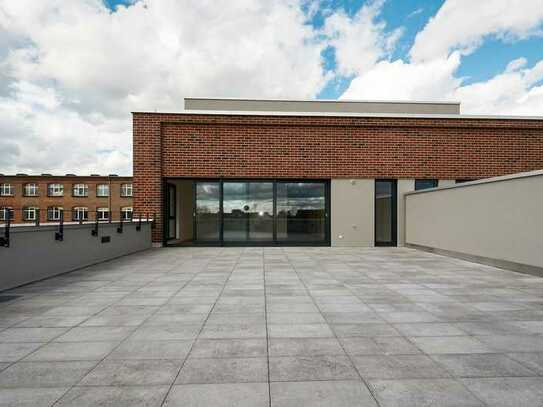 FACTORY SUITES: Bezugsfertig | Skylineblick und ca. 70 m2 Dachterrasse | It suits you.