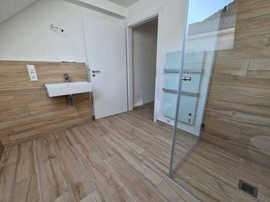Neubau: 2 ZKB + Balkon - Wohnen in der City.