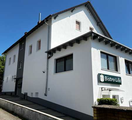 Angebot für Investoren: Vierfamilienhaus mit zwei Gewerbeinheiten in Zornheim zu verkaufen!