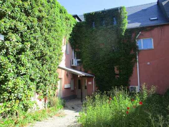 Wohn- und Geschäftshaus in Stollberg am Fluss Gablenz