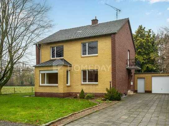 Einziehen und Wohlfühlen! Einfamilienhaus mit großem Grundstück, Garten, Terrasse und Garage