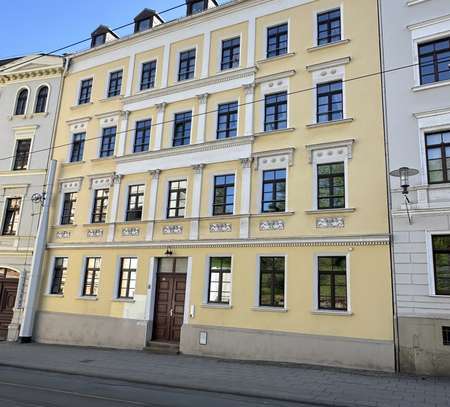 Zentrale, helle 3-Raumwohnung, im 1.Obergeschoss mit tollem Ausblick & sonnigem Gemeinschaftsgarten!