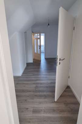 Renovierte 3-Zimmer-Wohnung mit Einbauküche und Garage