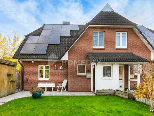 Praktische und gepflegte DHH mit Südterrasse, Kamin und Carport | Schöne Lage in Elbe-Nähe