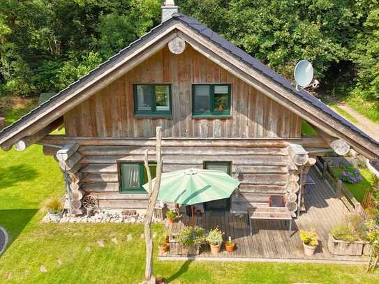 Nachhaltiges Naturstammhaus in idyllischer Lage – Energieeffizienz und Natur pur