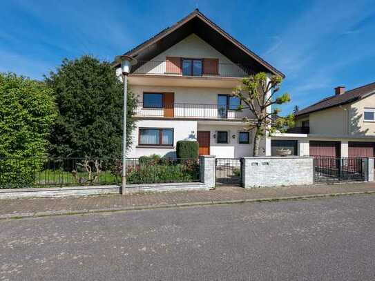 Einfamilienhaus mit Einliegerwohnung, und Garten in einer sehr begehrten und seltenen Randlage