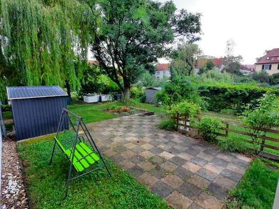 Großzügige 3-Raum-Wohnung mit Terrasse, Gartenanteil und Garage