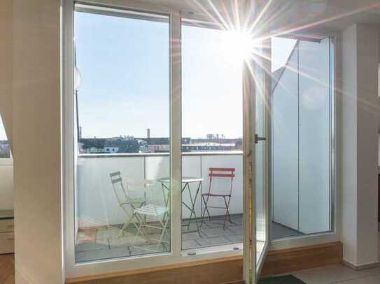 Lichtdurchflutete Dachgeschosswohnung mit Sonnenterrasse und Alpenblick