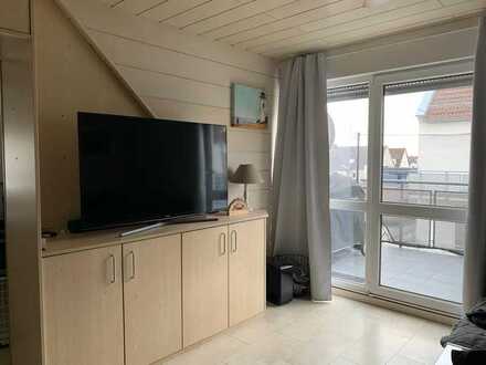Exklusive 2-Zimmer-Dachgeschosswohnung mit Balkon und Einbauküche in Büttelborn