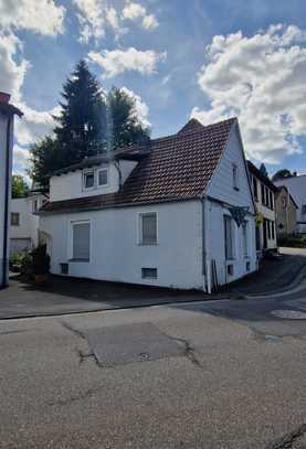 Einseitig angebautes 2 Familienhaus