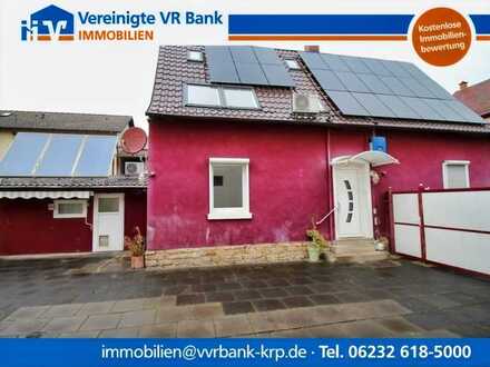Wohnhaus, vermietete Wohnung und Ausbaureserve