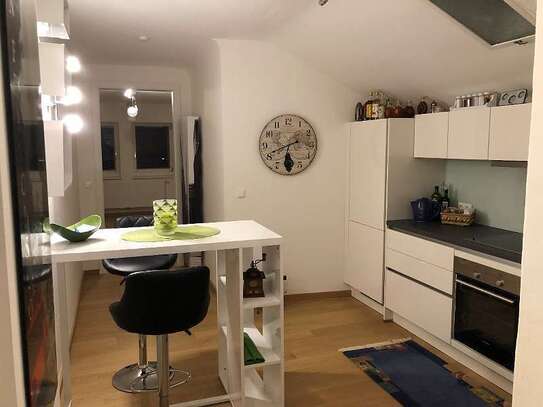 Geschmackvolle 1-Zimmer-Wohnung mit Balkon und Einbauküche in Rüsselsheim am Main