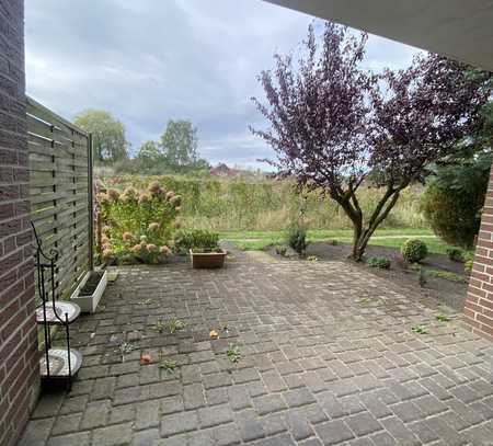 zwei Zimmerwohnung im Erdgeschoss mit Einbauküche und Terrasse