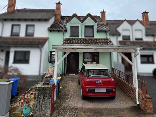 Schönes Reihenmittelhaus mit Carport und schönem Garten in guter Lage