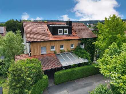 Schönes 4 Parteien Mehrfamilienhaus mit Garagen und Wintergarten