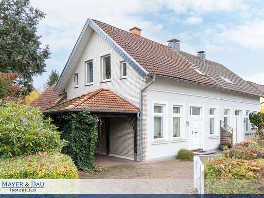 Oldenburg: Charmante Doppelhaushälfte mit großzügigem Garten, Wintergarten und Kamin Obj. 8183