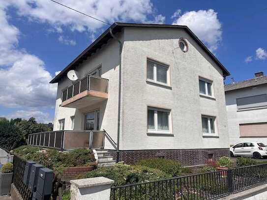 2-Familienhaus in ruhiger Wohnlage mit großem Garten und Garage