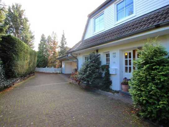 Elegantes Einfamilienhaus im modernen Landhausstil in Spitzenlage von Köln-Hahnwald