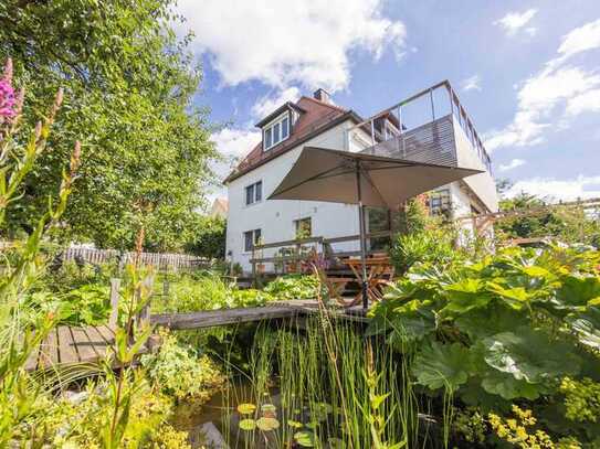 Attraktives Mehrfamilienhaus mit idyllischem Garten