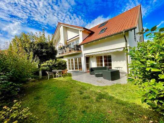 Helle EG-Wohnung mit Garten und Garage im Zweifamilienhaus