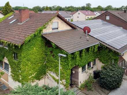 Wörth: Zwei- bis Dreifamilienhaus plus Ladengeschäft, idyllischer Garten!