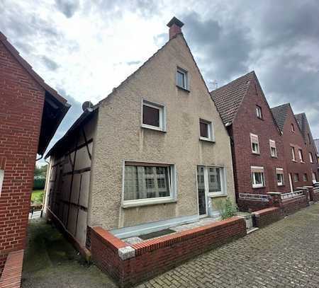 Günstige Gelegenheit - Kleines Einfamilienhaus mit Terrasse und Garage in Ahsen!