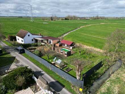 Zuhause Ruhe und Wellness genießen: Einfamilienhaus zur flexiblen Nutzung zwischen Feldern und Wiese