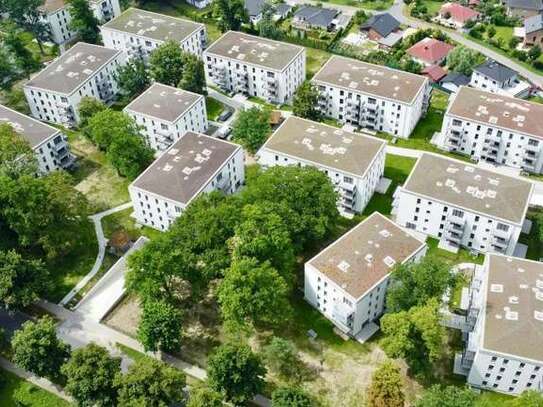 Moderne 4 Zimmer Wohnung mit großer Terrasse und kleinem Garten mitten im Park ERSTBEZUG