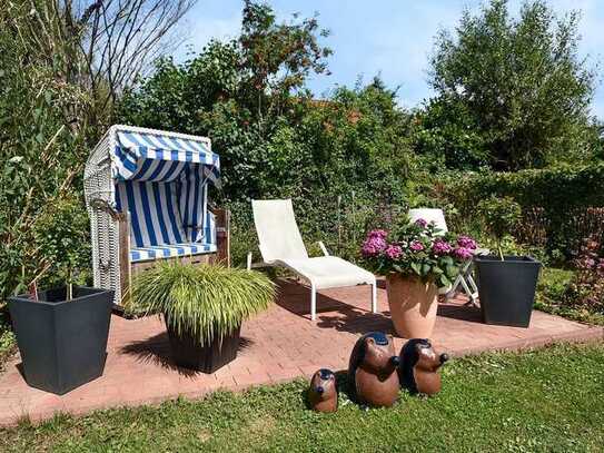 Wunderschöne Eigentumswohnung in idyllischer Lage mit eigenem Garten: Ihr Rückzugsort an der Ostsee!