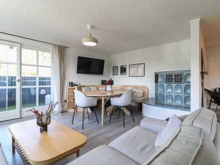 Gehobene 5-Zi.-Maisonette mit eigenem Garten und 2 Balkonen in familienfreundlicher Lage