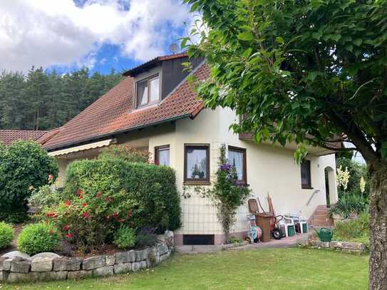 Wohnen mit besonderem Flair: Einfamilienhaus mit Gartenoase in ruhiger Lage!