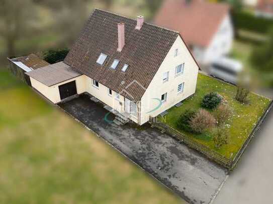 Viel Platz für die Familie – Zwei Wohneinheiten 
mit Garten, Garage und Ausbaupotential
