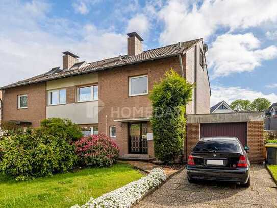 Familien aufgepasst! 1 bis 2-Familienhaus mit schönem Garten, Süd-Westterrasse und Garage