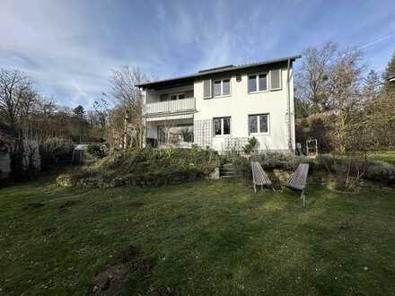 Bezauberndes 50er Jahre Einfamilienhaus mit traumhaftem Garten in bester Wohnlage von Schweinheim!
