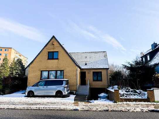 Einzigartiges Einfamilienhaus mit Einliegerwohnung und wunderschönem Garten!