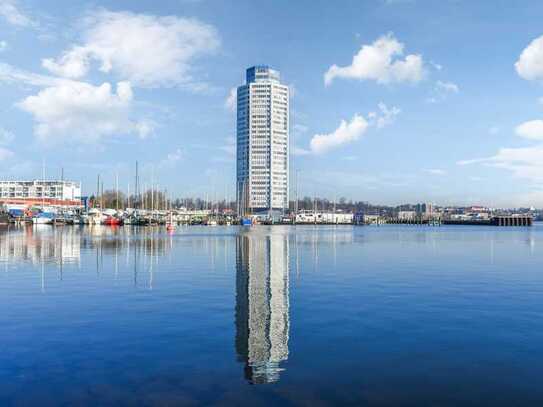 Kapitalanlage mit Ausblick: Einraumwohnung im 11. Stock mit Südbalkon auf bezahlter Erbpacht