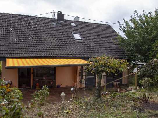 Traumhafte Lage - Gartenidylle - Einfamilienhaus mit Charme und Potenzial