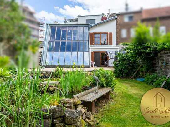 Außergewöhnliches Generationenhaus mit wunderbarem Garten in zentraler Stadtlage