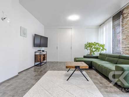 Renovierte und große 3-Zimmer-Eigentumswohnung mit neuem Bad, Garage und EBK in Innenstadtnähe