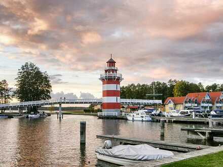 Exklusive Doppelhaushälfte - Ferienhaus direkt am Wasser mit eigenem Bootsanleger an der Terrasse