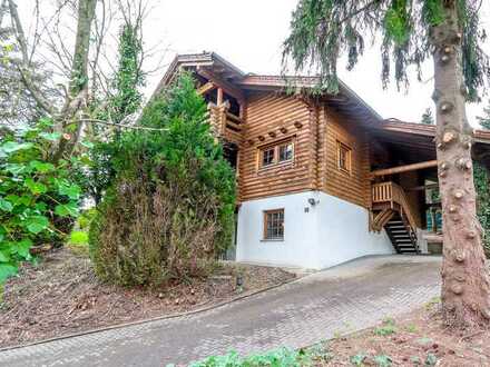 Außergewöhnliches Holzblockhaus in traumhafter Lage