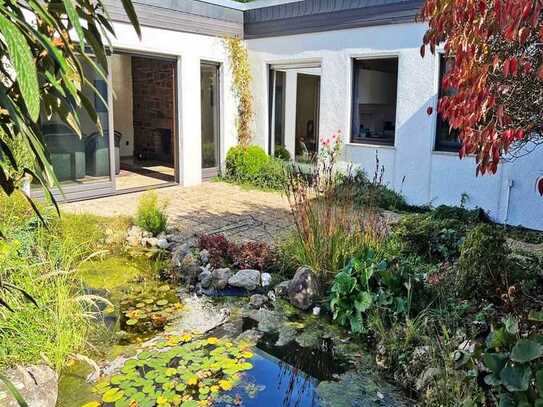 Großzügiger Bungalow, mit separatem Einliegerapartment, in Köln-Weiden!