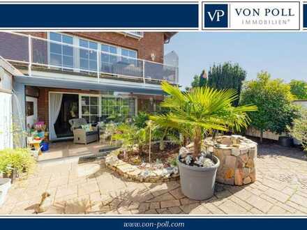 Moderne Erdgeschosswohnung mit Wintergarten, Terrasse und Garage in traumhafter Feldrandlage