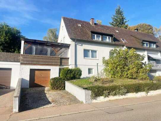 Doppelhaushälfte mit viel Potential, überdachter Terrasse, Garage und großem Garten, zu verkaufen