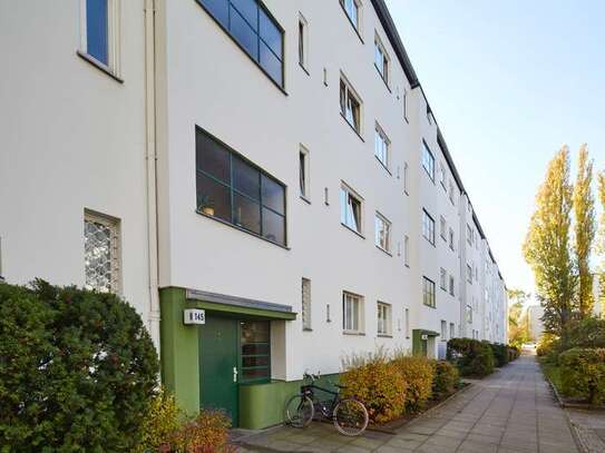 2-Zimmerwohnung mit Balkon in denkmalgeschützter Siedlung Nahe Kurt-Schumacher-Platz wartet auf Sie!