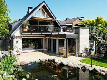 Das ideale Mehrgenerationenhaus mit 2 Wohnungen und großem Garten/Schwimmteich in sehr guter Lage