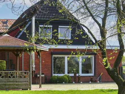 Preisreduktion: Gepflegtes Einfamilienhaus mit sonnigem Garten und großem Hof in Feldranlage