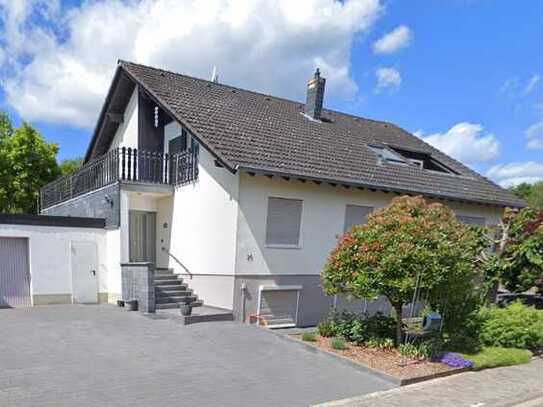 Idyllisches Einfamilienhaus mit Einliegerwohnung und traumhaftem Garten